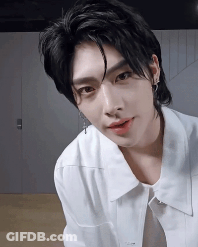 A Close Up Of A Person Wearing A White Shirt GIF
