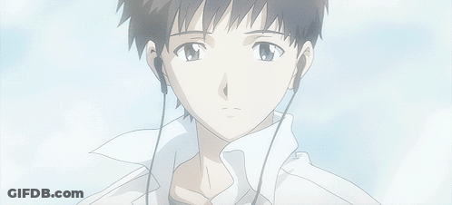 A Close Up Of A Person Wearing Earphones GIF