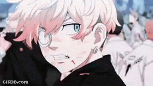 A Close Up Of A Person Wearing Glasses And A Black Jacket In A Crowd . GIF