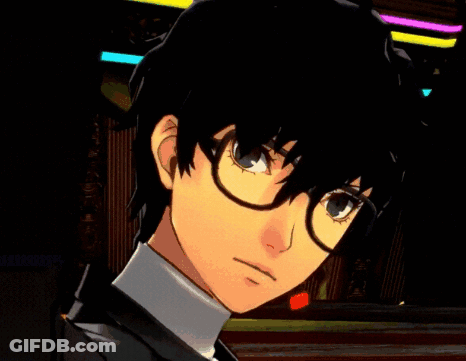 A Close Up Of A Person Wearing Glasses And A Black Suit GIF