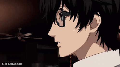 A Close Up Of A Person Wearing Glasses In A Room With A Ceiling Fan . GIF