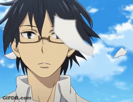 A Close Up Of A Person Wearing Glasses With A Piece Of Paper Flying In The Air GIF