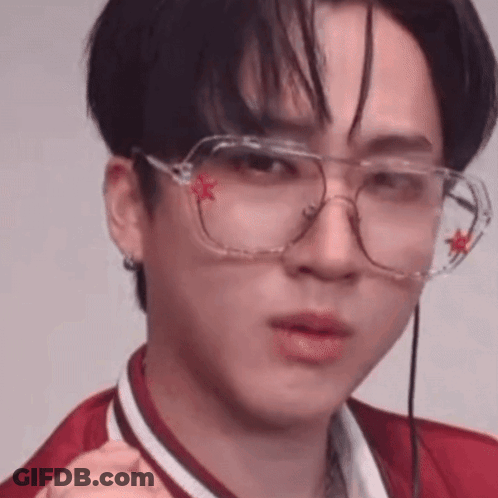 A Close Up Of A Person Wearing Glasses With A Red Star On Them . GIF