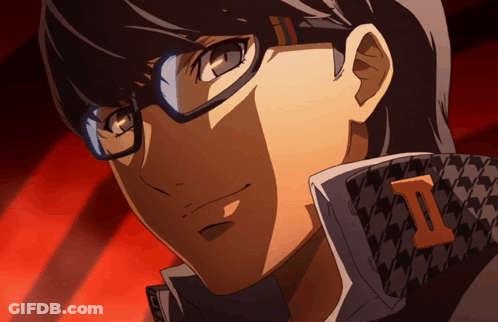 A Close Up Of A Person Wearing Glasses With The Letter I On His Jacket GIF