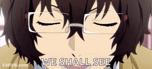 A Close Up Of A Person Wearing Glasses With The Words `` We Shall See '' Written On It . GIF
