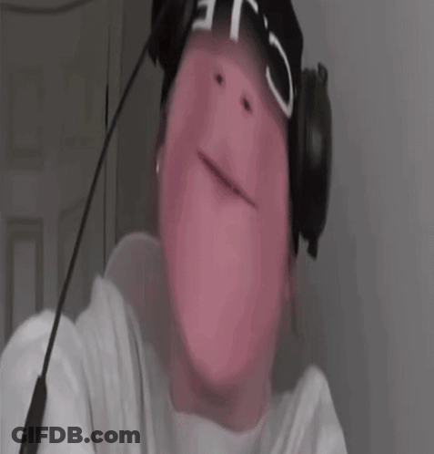 A Close Up Of A Person Wearing Headphones And A Headband . GIF