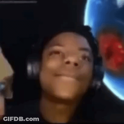 A Close Up Of A Person Wearing Headphones Looking Up At The Camera . GIF