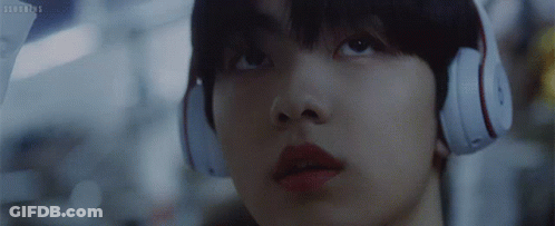 A Close Up Of A Person Wearing Headphones With The Letters Sd On The Bottom Right GIF