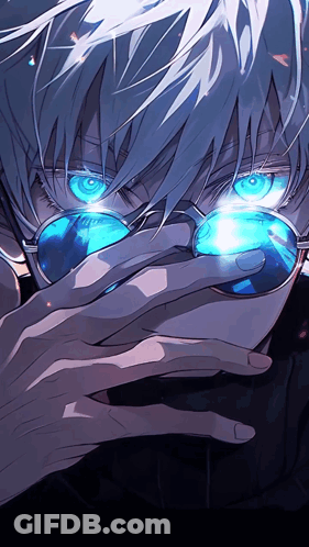A Close Up Of A Person Wearing Sunglasses And Covering Their Face With Their Hand GIF