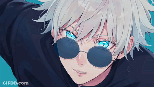 A Close Up Of A Person Wearing Sunglasses And Smiling GIF