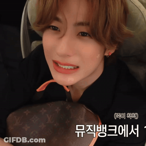 Close Up Of Person With Louis Vuitton Bag GIF