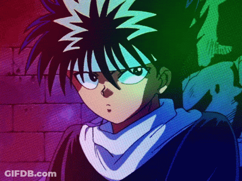 A Close Up Of A Person With A Rainbow Background GIF