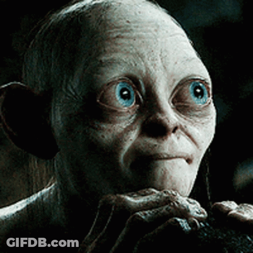 A Close Up Of A Person With Blue Eyes Looking At The Camera GIF