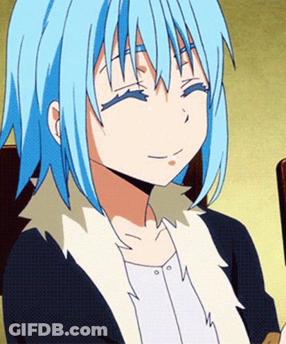 A Close Up Of A Person With Blue Hair And A White Shirt GIF
