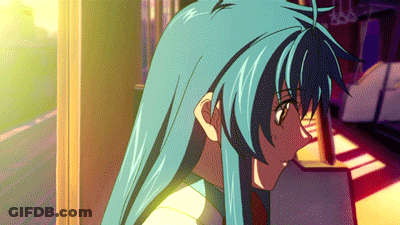 A Close Up Of A Person With Blue Hair And Glasses GIF