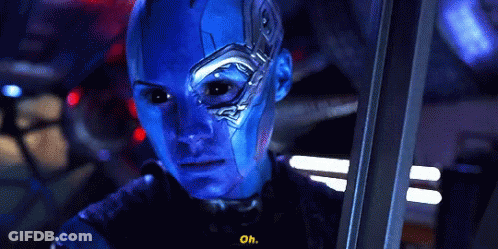 A Close Up Of A Person With Blue Paint On Their Face And The Words Oh On The Bottom GIF