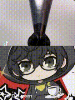 A Close Up Of A Person With Glasses And A Cup Of Coffee . GIF