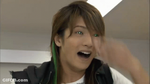 A Close Up Of A Person With Green Eyes GIF