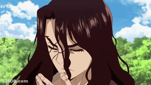 A Close Up Of A Person With Long Hair Covering Their Mouth GIF