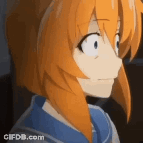 A Close Up Of A Person With Orange Hair And Blue Eyes . GIF