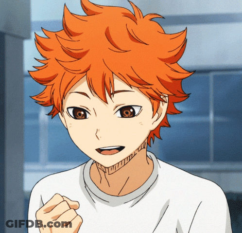 A Close Up Of A Person With Orange Hair And Brown Eyes GIF