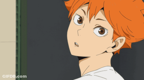 A Close Up Of A Person With Orange Hair And Brown Eyes GIF