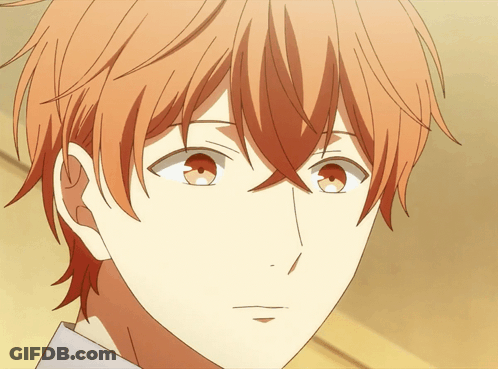 A Close Up Of A Person With Orange Hair GIF