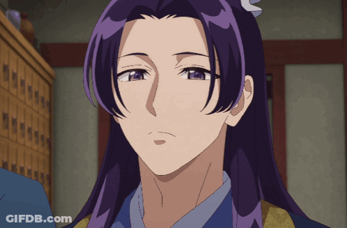 Close Up Of Person With Purple Hair And Blue Eyes GIF