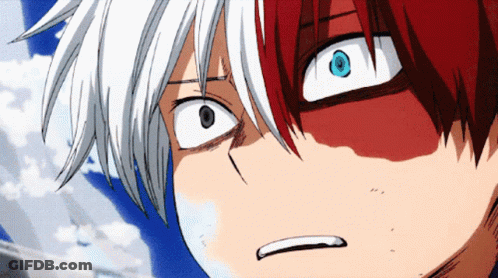 A Close Up Of A Person With Red And White Hair GIF