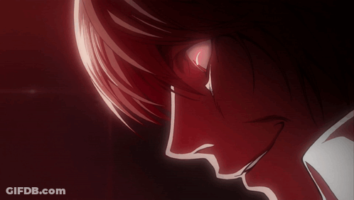 A Close Up Of A Person With Red Eyes GIF