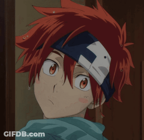 A Close Up Of A Person With Red Hair And A Bandage On Their Head GIF