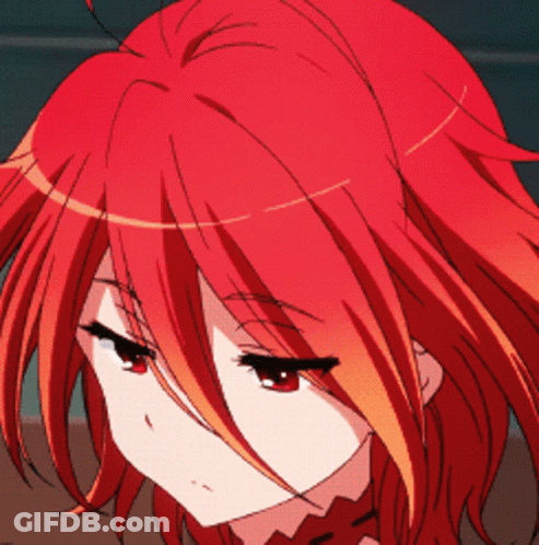 A Close Up Of A Person With Red Hair GIF