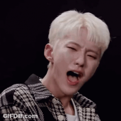 A Close Up Of A Person With Their Mouth Open And Their Tongue Out . GIF
