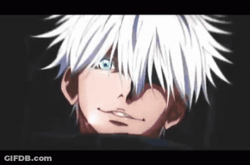 A Close Up Of A Person With White Hair And Blue Eyes . GIF