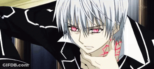 A Close Up Of A Person With White Hair And Red Eyes GIF