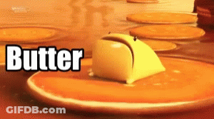 A Close Up Of A Piece Of Butter On A Pancake GIF