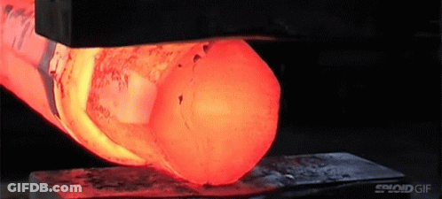 A Close Up Of A Piece Of Metal Being Heated By A Machine . GIF