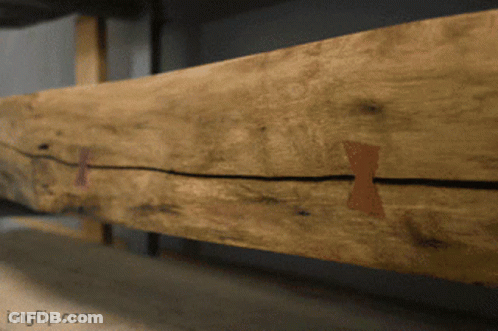 A Close Up Of A Piece Of Wood That Says Imgflip.com On The Bottom Right GIF