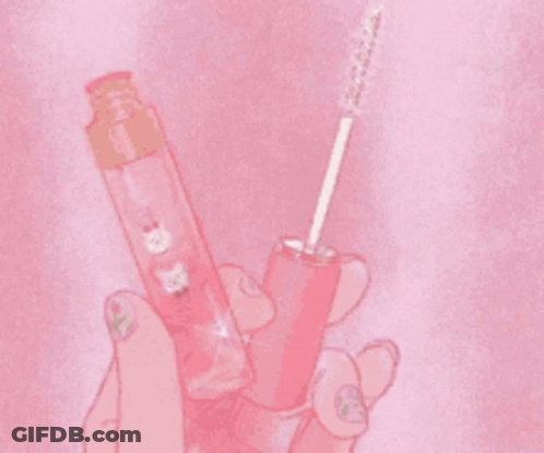 A Close Up Of A Pink Bag With A Stuffed Animal On It . GIF