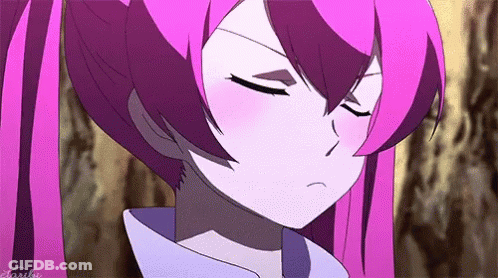 A Close Up Of A Pink Haired Anime Girl With Her Eyes Closed And A Serious Look On Her Face . GIF