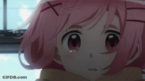 A Close Up Of A Pink Haired Anime Girl With Tears Coming Out Of Her Eyes . GIF
