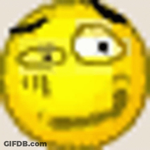 A Close Up Of A Pixelated Smiley Face With A Slight Smile On Its Face . GIF