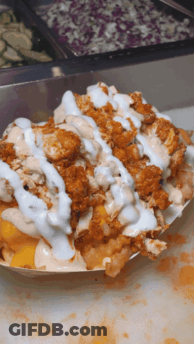 A Close Up Of A Plate Of Food With Sauces On Top GIF