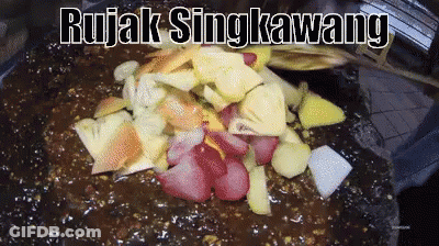 A Close Up Of A Plate Of Food With The Words Rujak Singkawang Above It GIF