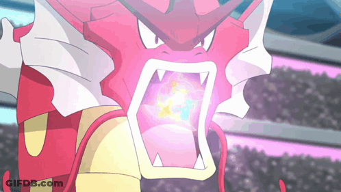 A Close Up Of A Pokemon With Its Mouth Open And Glowing GIF