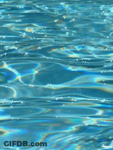 A Close Up Of A Pool Of Water With A Rainbow Colored Reflection GIF