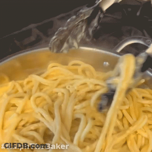 A Close Up Of A Pot Of Noodles With The Hashtag #Ralphthebaker Visible GIF