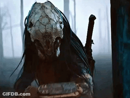A Close Up Of A Predator With A Sword GIF