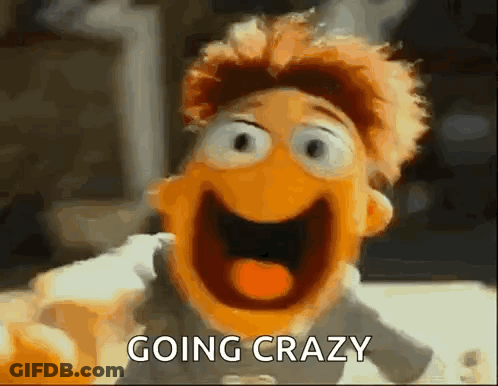A Close Up Of A Puppet With Its Mouth Open And The Words `` Going Crazy '' Written Above It . GIF
