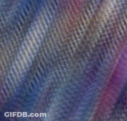 A Close Up Of A Purple , Blue And White Striped Background GIF